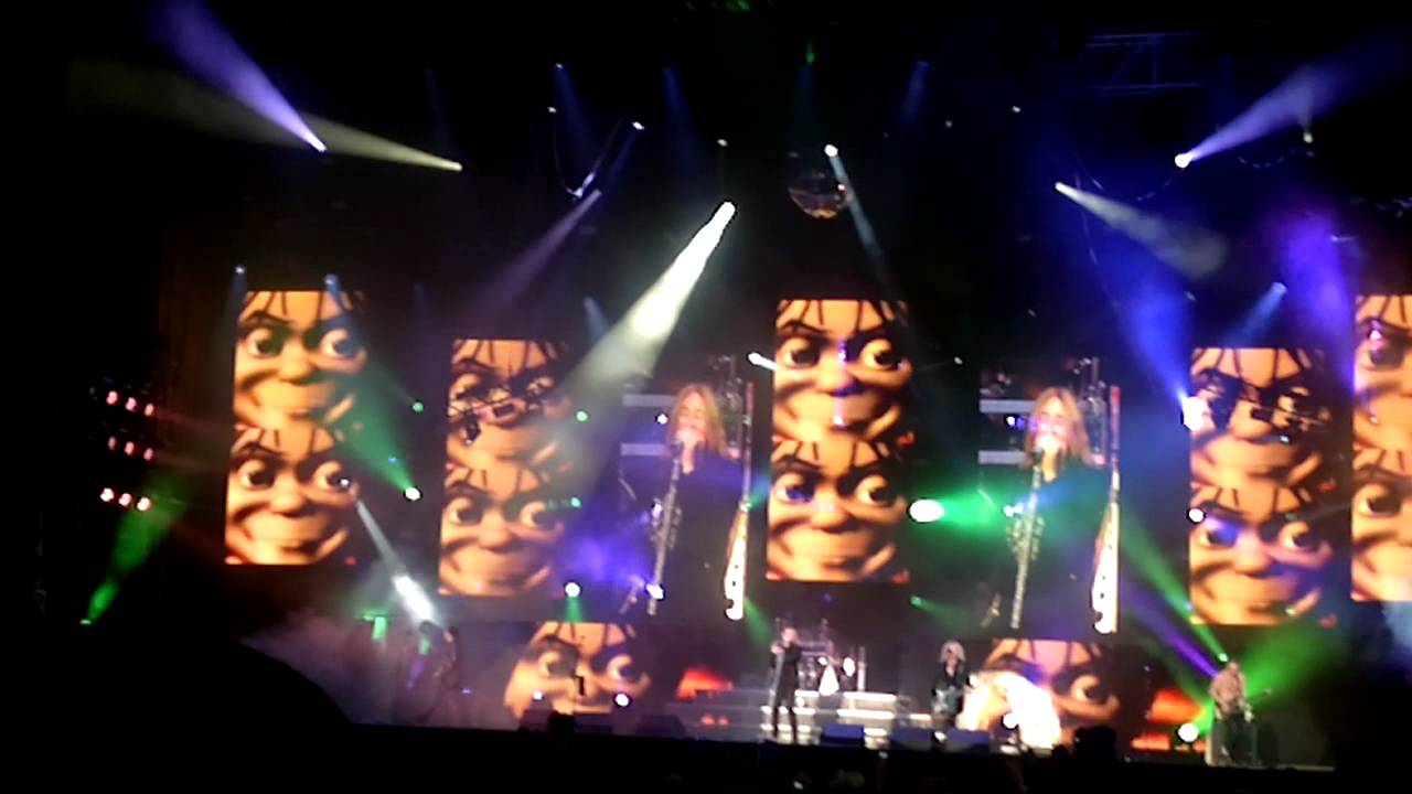 Def Leppard concert at the Download Festival 2011, with the Let's Get Rocked character's face on the big screen.