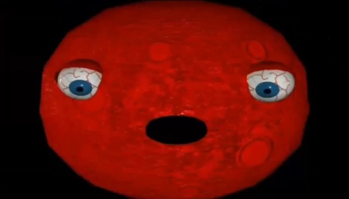 Spiderbait - Calypso music video. Stoned red sphere making a gasping face.