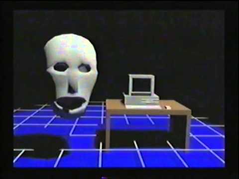 Eerie CGI animation of a white face mask in front of a computer.