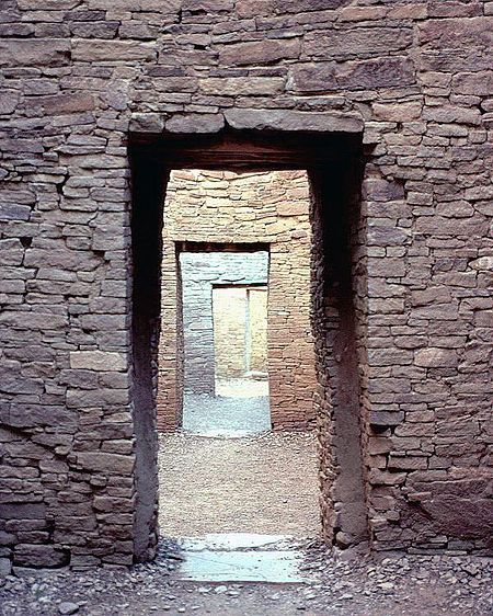 Four stone doorways aligned in an ancient pueblo.